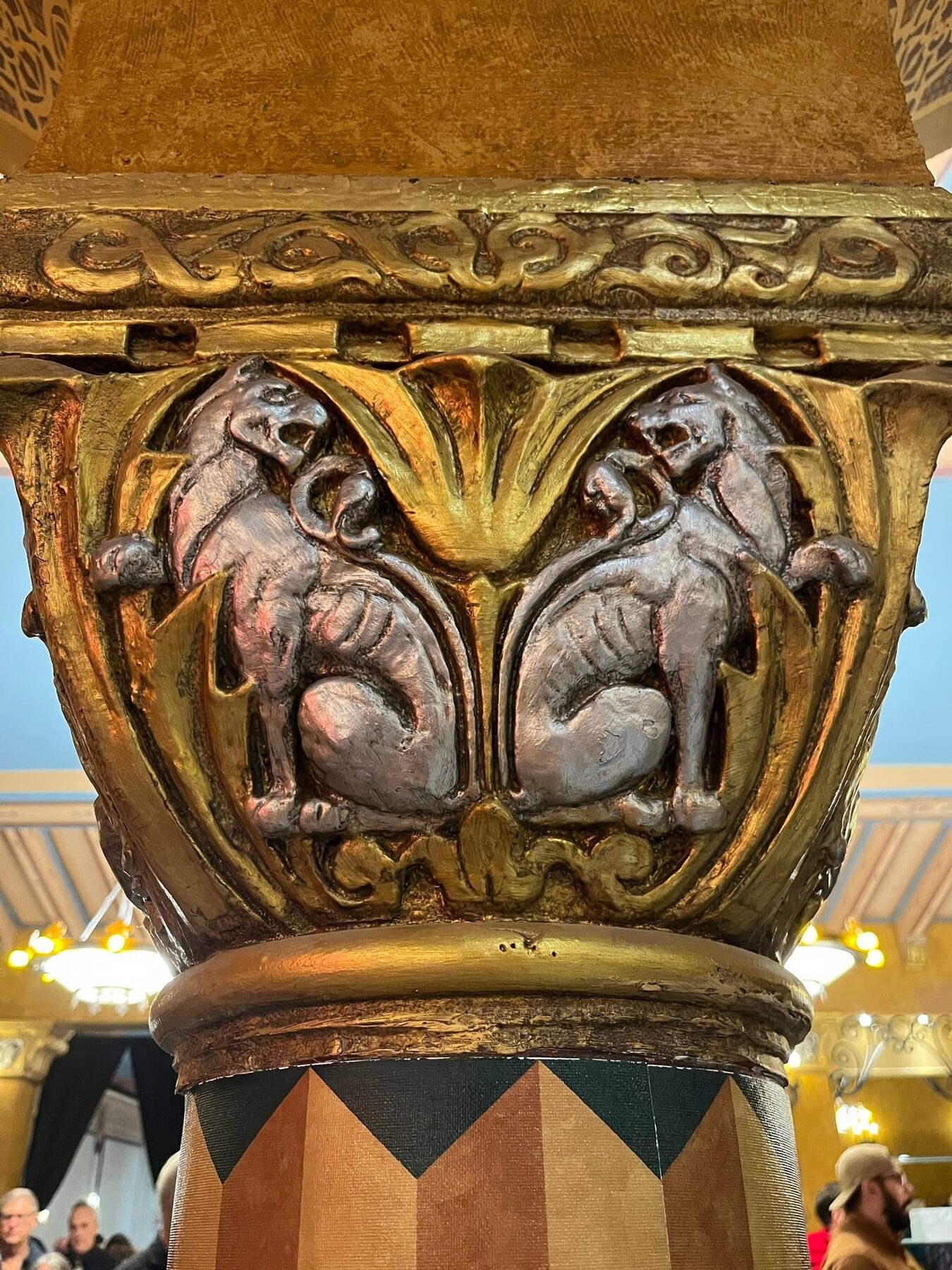 A restored decorative capital with paired animal figures