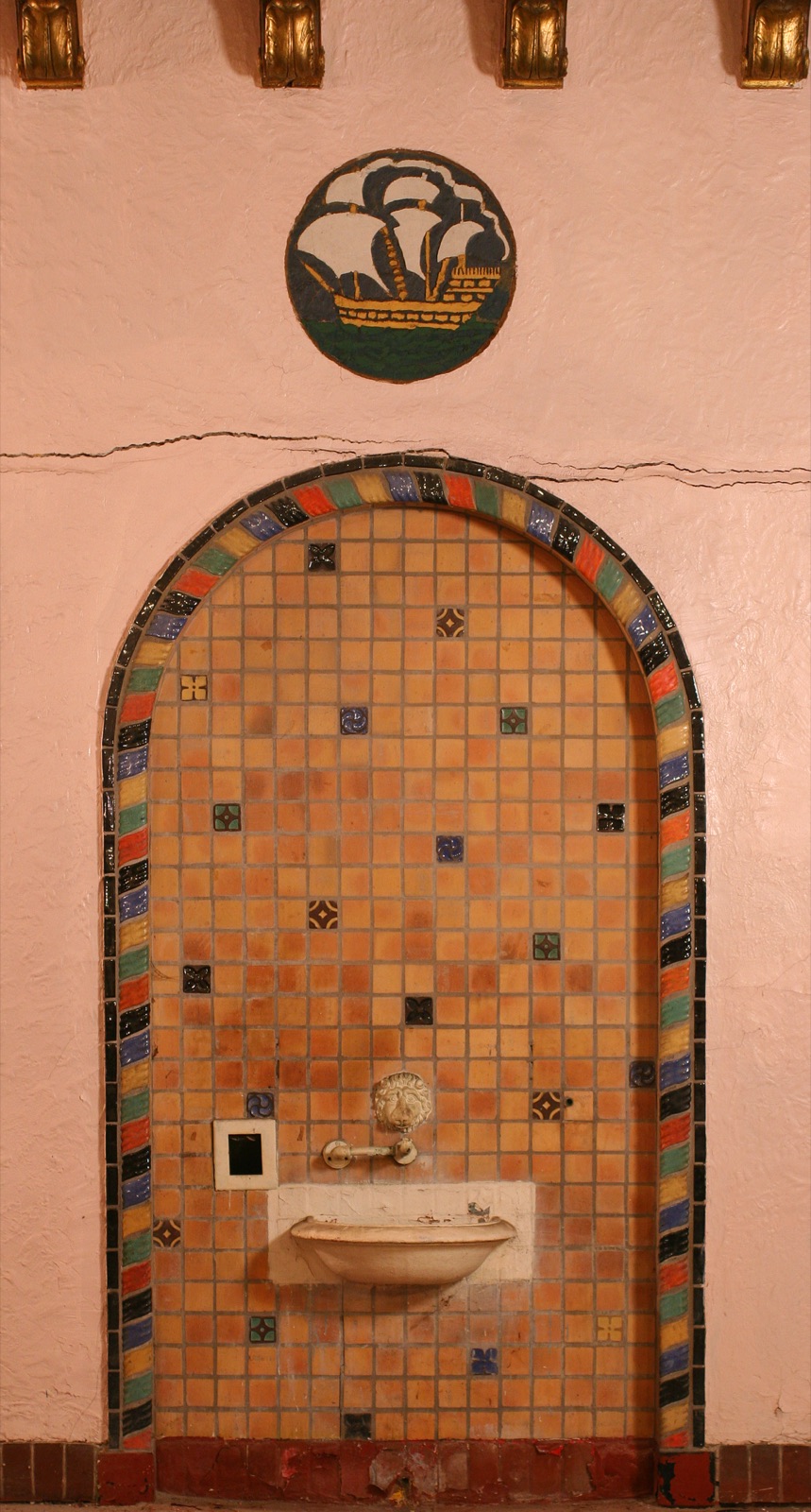The tile-clad lobby fountain